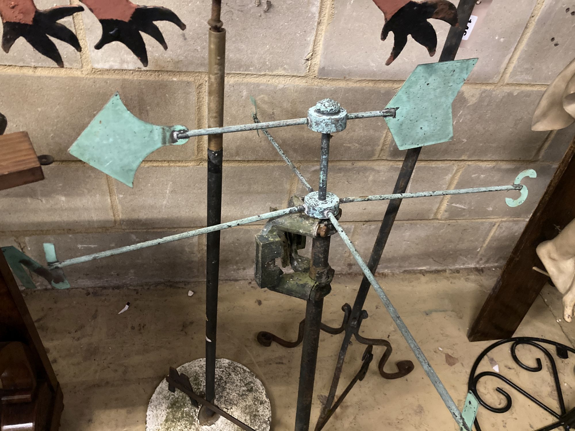 Three cast iron and metal weather vanes, largest 158cm high